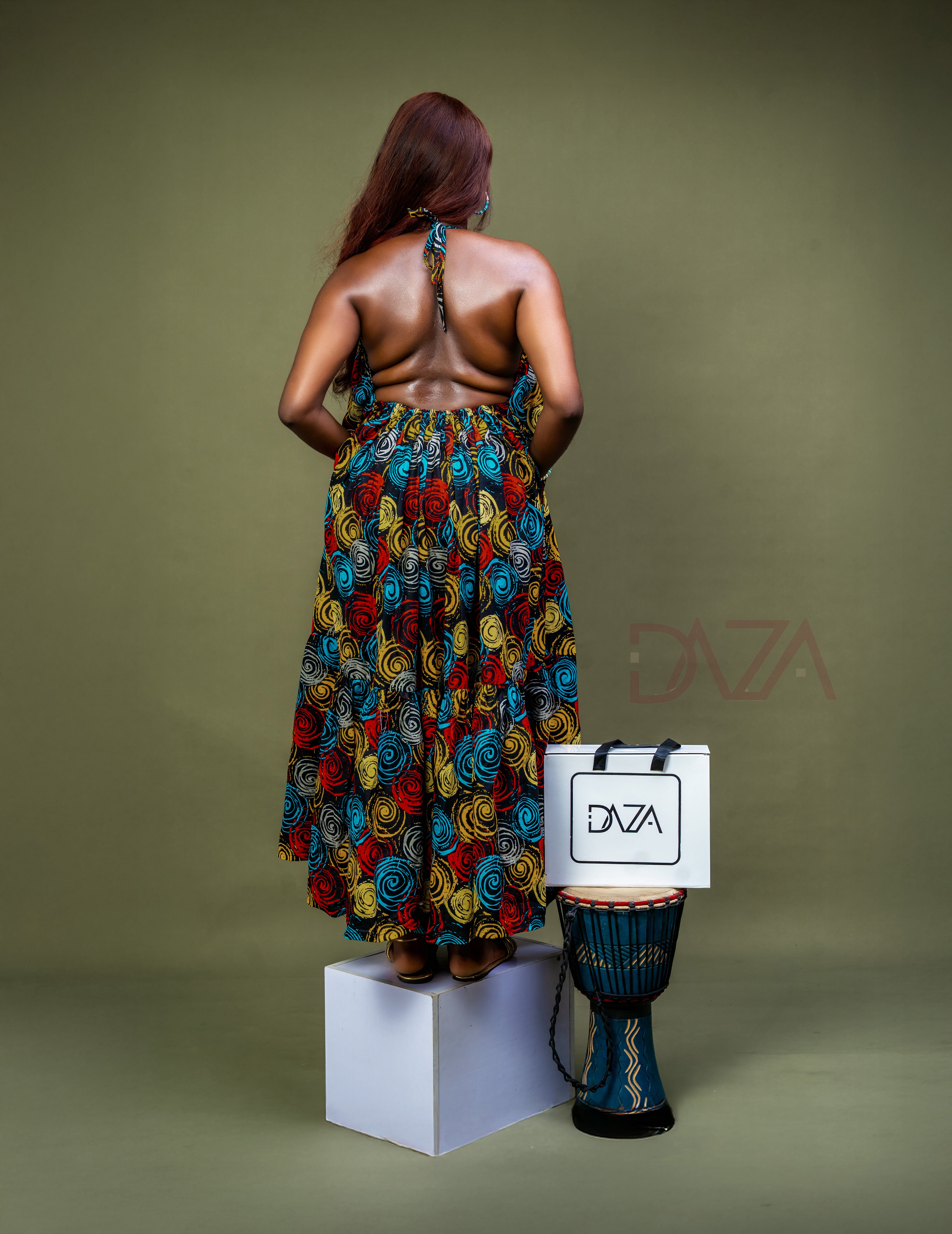 African maxi dress with halter neck and open back

Boho Ankara resort wear dress for women

Flowy maternity-friendly Ankara gown

Ankara holiday outfit for beach or vacation

Caribbean-inspired African print dress