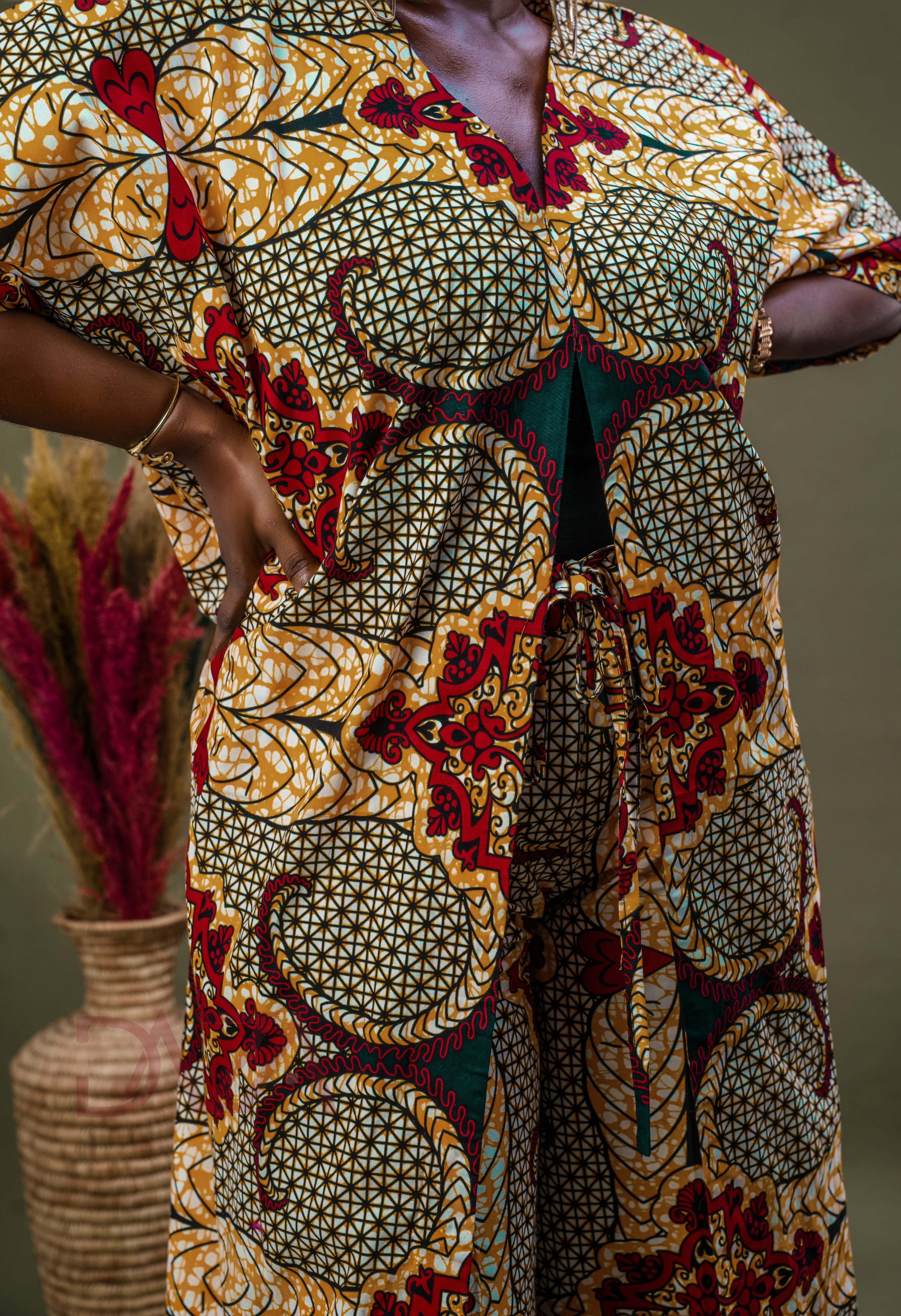 Vibrant Ankara kimono and pant set for Black women

African print two-piece for weddings and workwear

Tailored Ankara outfit for diaspora fashionistas

Bold African kimono jacket and trousers set

Chic African fashion for events, brunch, or business