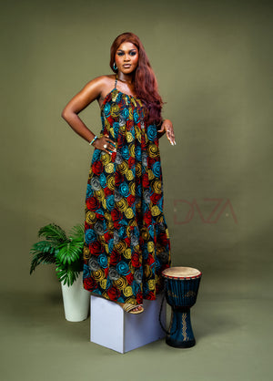 Ankara resort wear halter dress for women

Afrocentric backless maxi gown with Caribbean vibe

African maternity fashion dress with flowy design

Bold African print vacation gown

Modern African dress for summer events and travel